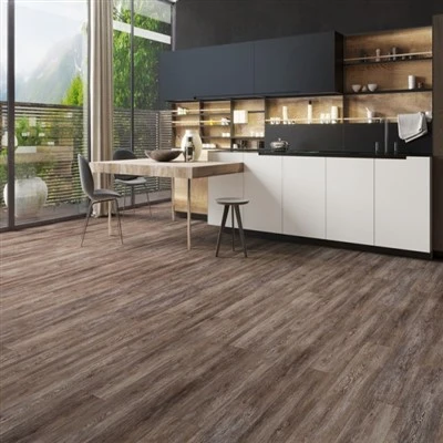 SPC luxury vinyl flooring planks installed in a room with skirting along the perimeter SPC luxury vinyl flooring planks installed in a room with skirting along the perimeter