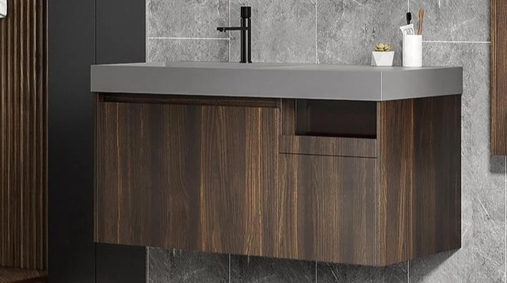 Bathroom vanity cabinet constructed from PVC laminated foam board panels with woodgrain finish installed in a humid bathroom environment with no edge swelling visible Bathroom vanity cabinet constructed from PVC laminated foam board panels with woodgrain finish installed in a humid bathroom environment with no edge swelling visible
