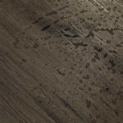 Close-up of an SPC flooring plank showing the click lock profile milled into the rigid stone core edge Close-up of an SPC flooring plank showing the click lock profile milled into the rigid stone core edge